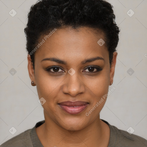 Joyful black young-adult female with short  black hair and brown eyes