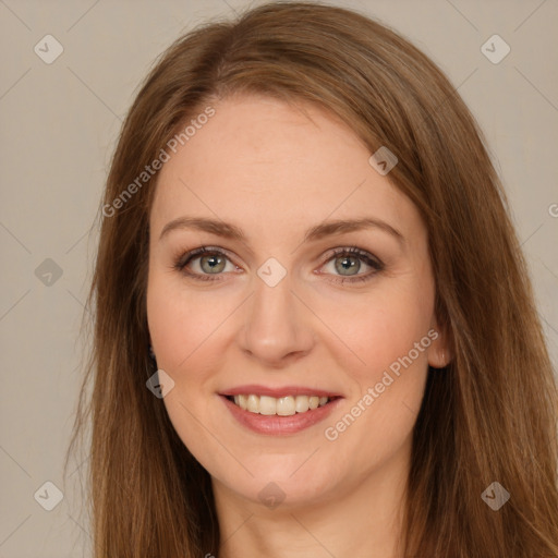 Joyful white young-adult female with long  brown hair and green eyes