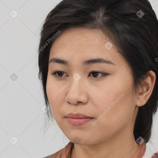 Neutral asian young-adult female with medium  brown hair and brown eyes