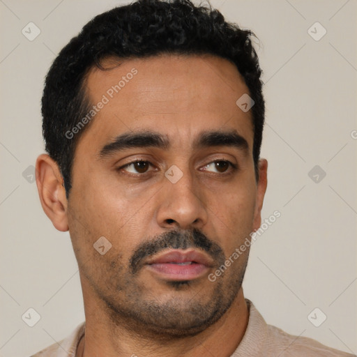 Neutral latino young-adult male with short  black hair and brown eyes