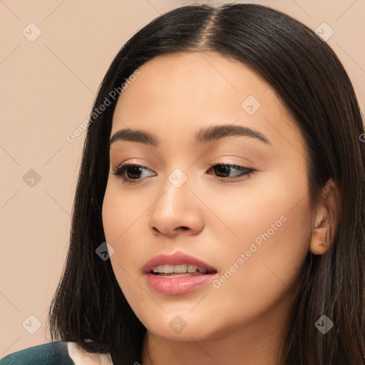 Joyful white young-adult female with long  black hair and brown eyes