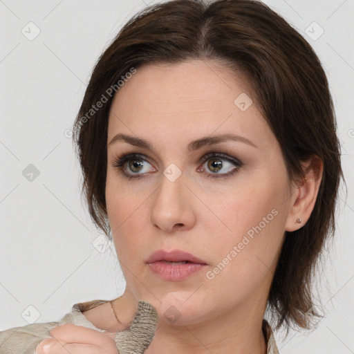 Neutral white young-adult female with medium  brown hair and brown eyes