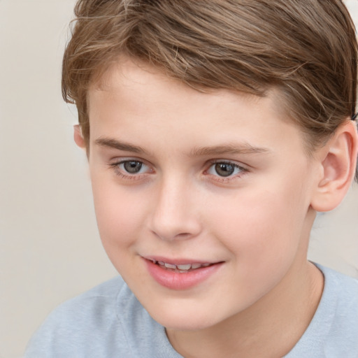 Joyful white child female with short  brown hair and brown eyes