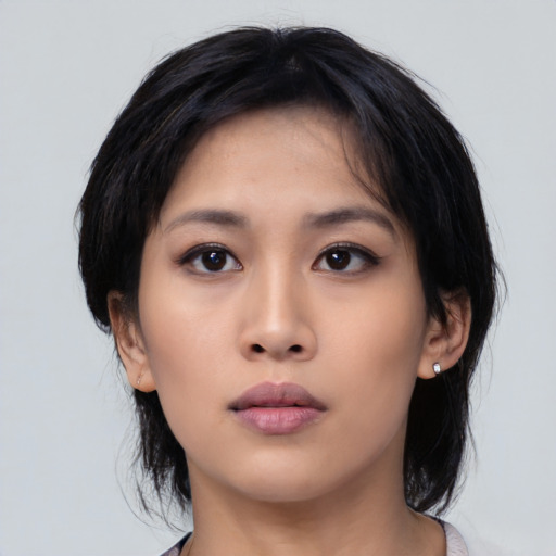 Neutral asian young-adult female with medium  black hair and brown eyes