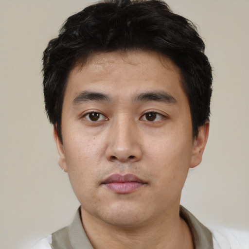 Neutral asian young-adult male with short  black hair and brown eyes
