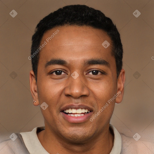 Joyful black young-adult male with short  black hair and brown eyes