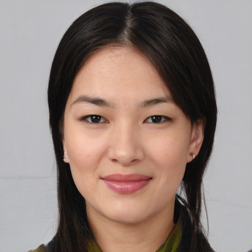 Joyful asian young-adult female with medium  brown hair and brown eyes