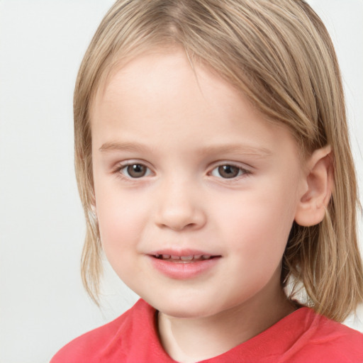 Joyful white child female with medium  brown hair and grey eyes