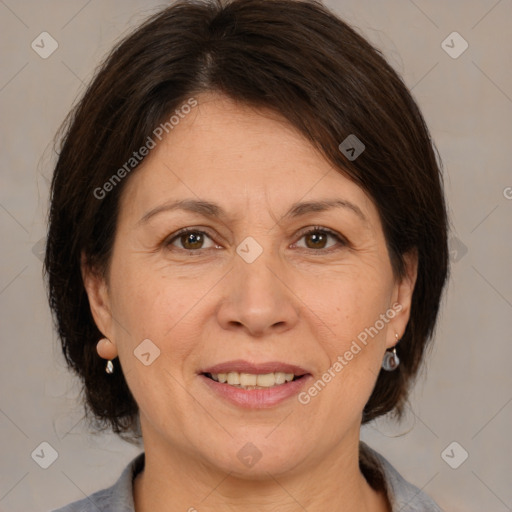 Joyful white adult female with medium  brown hair and brown eyes