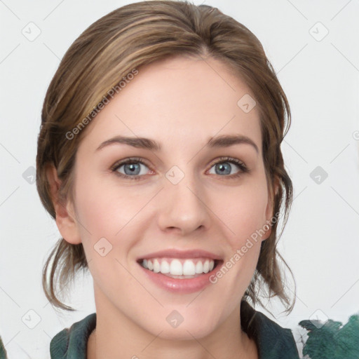 Joyful white young-adult female with medium  brown hair and blue eyes