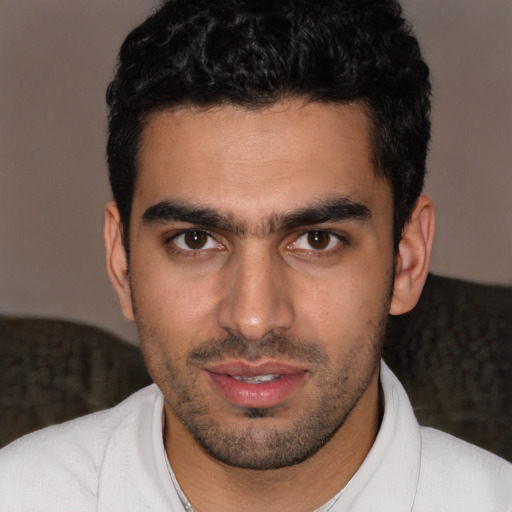 Neutral white young-adult male with short  black hair and brown eyes