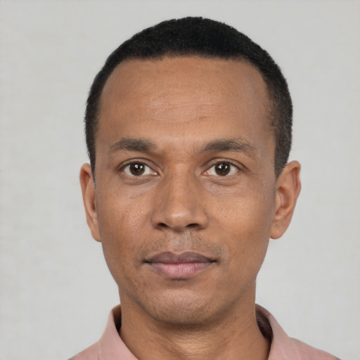 Neutral latino adult male with short  black hair and brown eyes