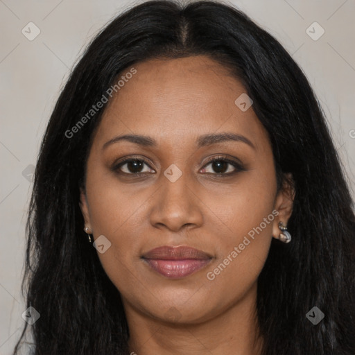 Joyful latino young-adult female with long  brown hair and brown eyes