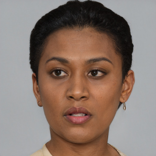 Neutral latino young-adult female with short  brown hair and brown eyes