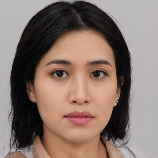 Neutral asian young-adult female with medium  black hair and brown eyes