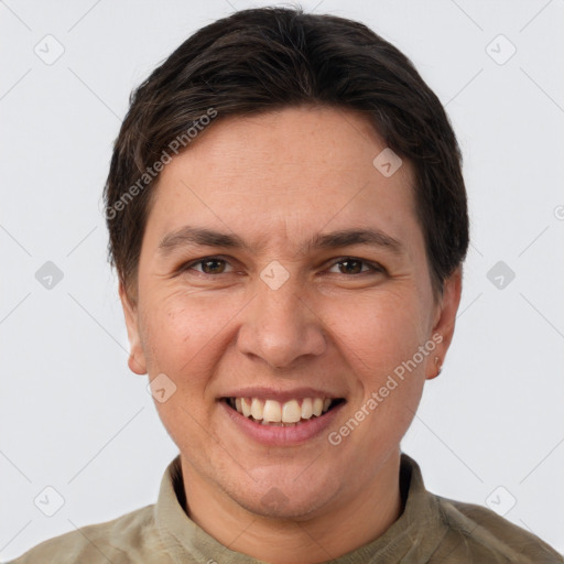 Joyful white adult female with short  brown hair and grey eyes