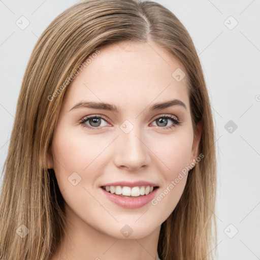 Joyful white young-adult female with long  brown hair and green eyes