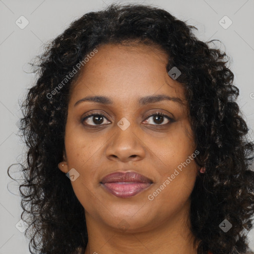 Joyful black young-adult female with medium  brown hair and brown eyes