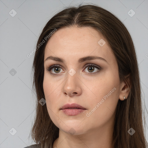 Neutral white young-adult female with long  brown hair and brown eyes