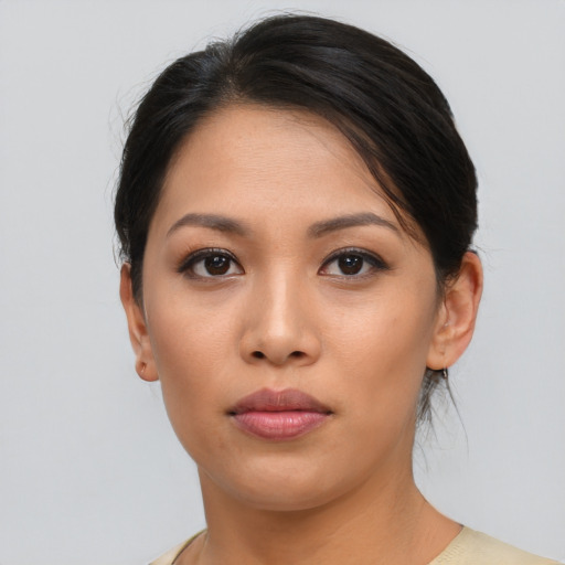 Neutral asian young-adult female with medium  brown hair and brown eyes