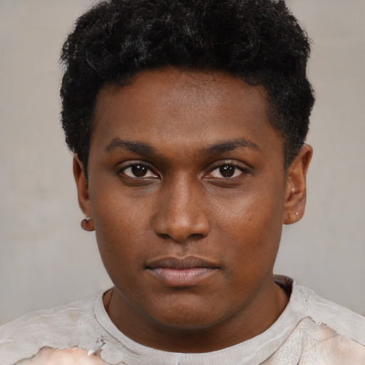 Neutral black young-adult male with short  brown hair and brown eyes