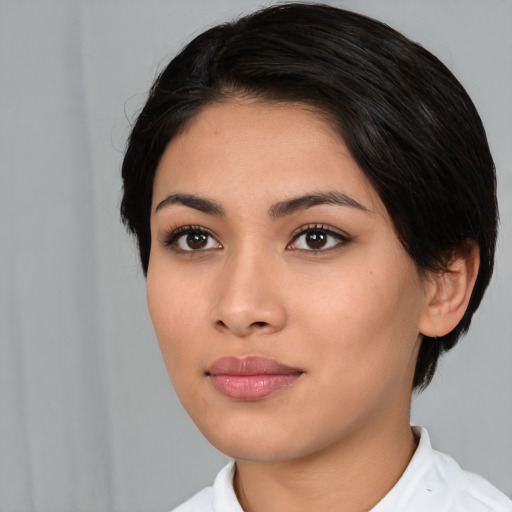 Neutral asian young-adult female with medium  black hair and brown eyes