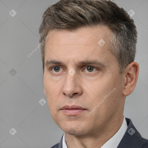 Neutral white adult male with short  brown hair and brown eyes