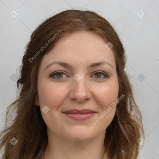 Joyful white young-adult female with long  brown hair and green eyes