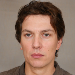 Neutral white adult male with short  brown hair and brown eyes