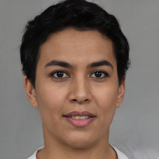 Joyful asian young-adult female with short  black hair and brown eyes