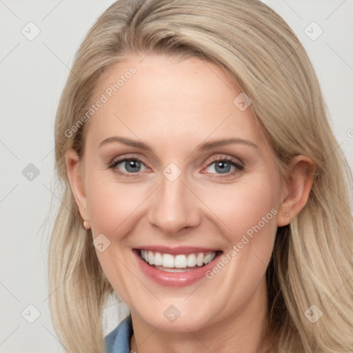 Joyful white young-adult female with long  brown hair and blue eyes