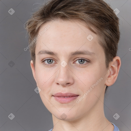 Joyful white young-adult female with short  brown hair and grey eyes
