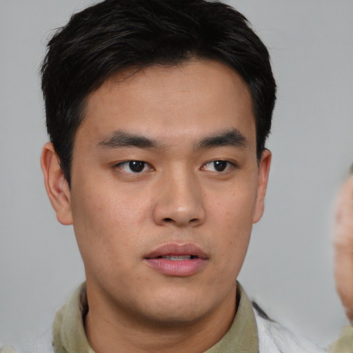 Neutral asian young-adult male with short  brown hair and brown eyes