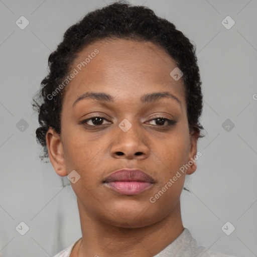 Neutral black young-adult female with short  brown hair and brown eyes