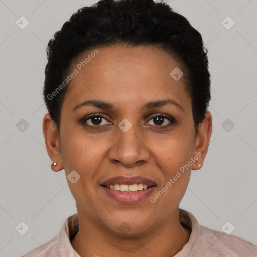 Joyful latino adult female with short  black hair and brown eyes