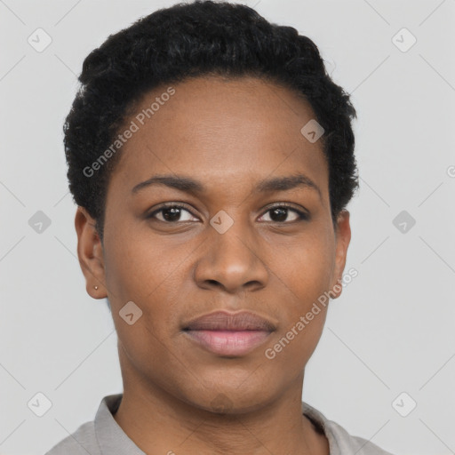 Joyful black young-adult female with short  black hair and brown eyes