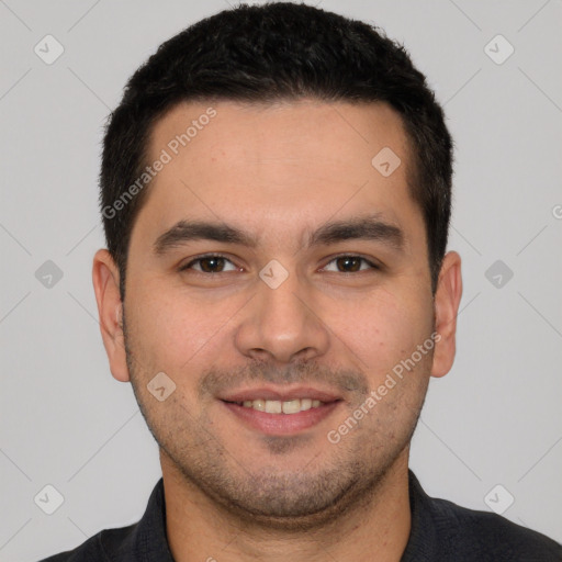 Joyful white young-adult male with short  black hair and brown eyes