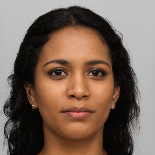 Neutral latino young-adult female with long  black hair and brown eyes
