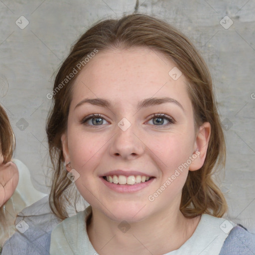 Joyful white young-adult female with medium  brown hair and blue eyes