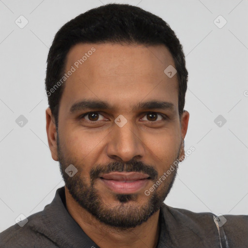 Joyful black young-adult male with short  black hair and brown eyes