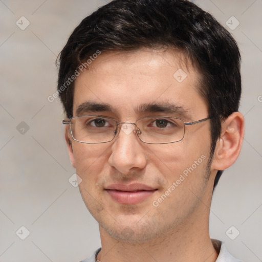 Joyful white adult male with short  brown hair and brown eyes