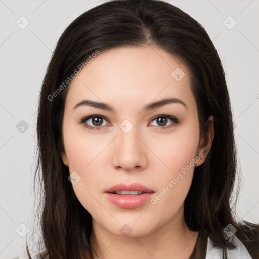 Neutral white young-adult female with long  brown hair and brown eyes