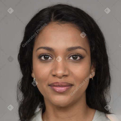 Joyful black young-adult female with long  brown hair and brown eyes