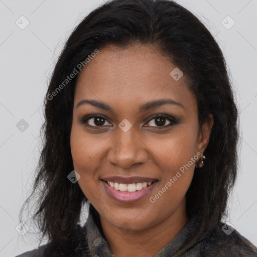 Joyful black young-adult female with long  brown hair and brown eyes