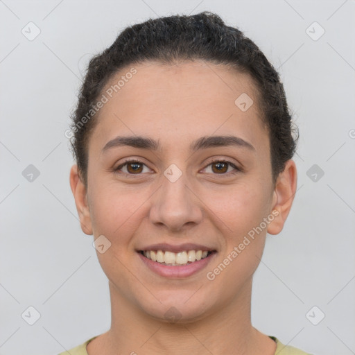 Joyful white young-adult female with short  brown hair and brown eyes