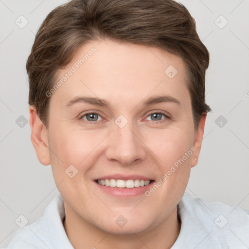 Joyful white young-adult female with short  brown hair and grey eyes