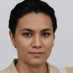 Joyful asian young-adult female with short  brown hair and brown eyes