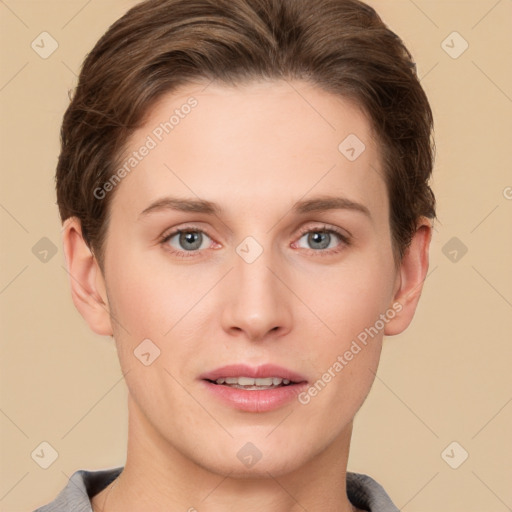 Joyful white young-adult female with short  brown hair and grey eyes