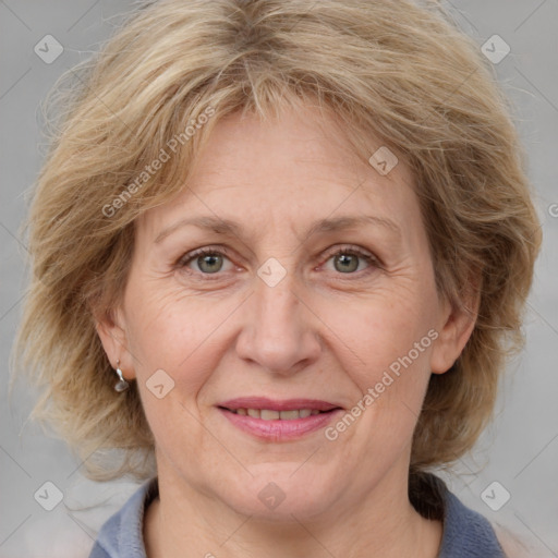 Joyful white adult female with medium  brown hair and blue eyes