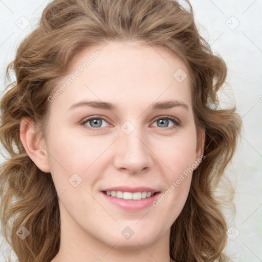 Joyful white young-adult female with medium  brown hair and green eyes